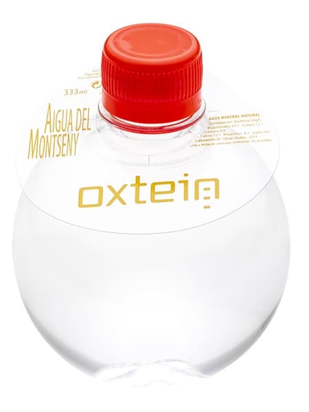 333 Botella redonda. Collarín PVC 1 color. Tapón rojo