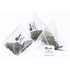 Personalized box with 15 Redbus pyramids of Rooibos. Full color label + 1 color on envelope and tag